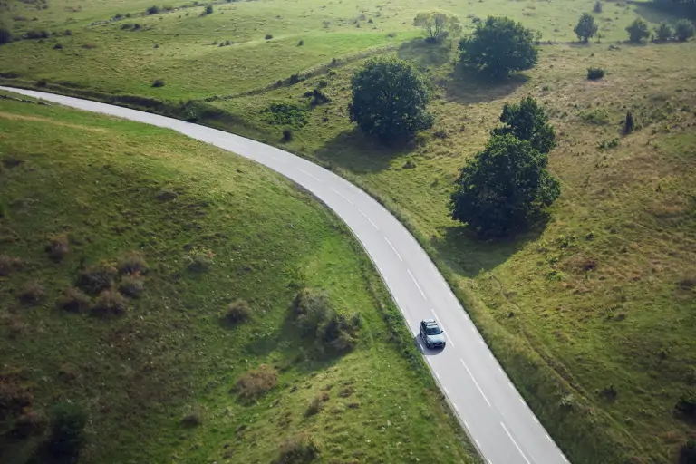 Volvo driving through countryside
